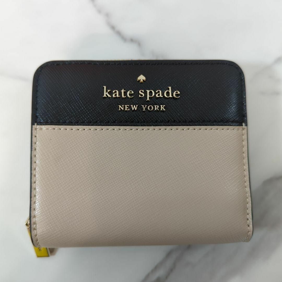 kate spade new york(ケイトスペードニューヨーク)のケイトスペード 二つ折り財布 ベージュ✕ブラック［新品・直営店購入］ レディースのファッション小物(財布)の商品写真