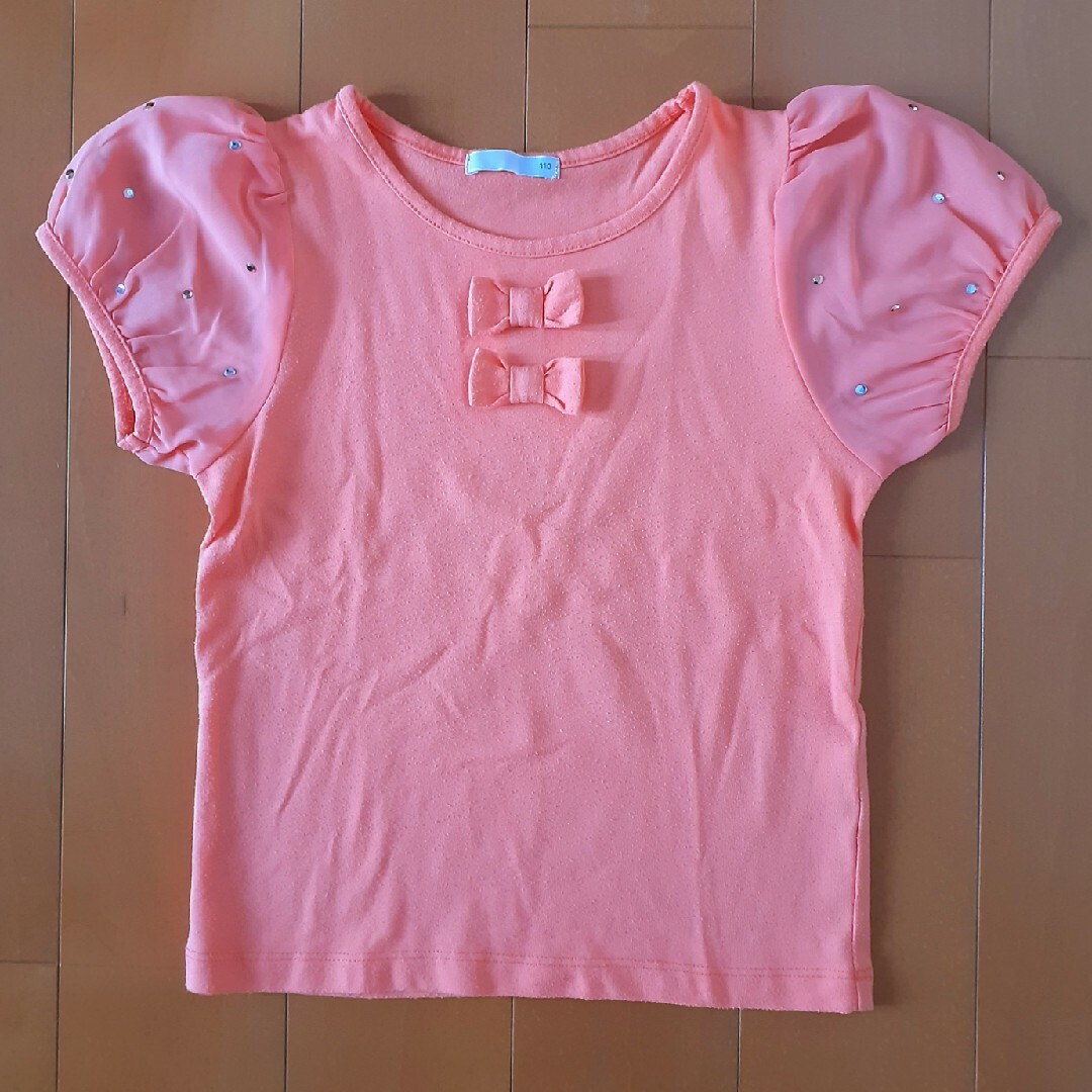 GU(ジーユー)のオレンジ色　トップス　110 キッズ/ベビー/マタニティのキッズ服女の子用(90cm~)(Tシャツ/カットソー)の商品写真