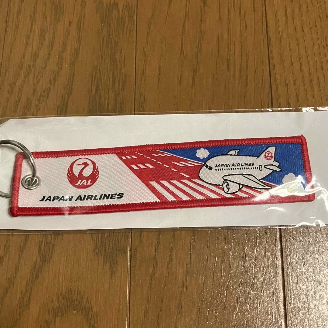 JAL(日本航空)(ジャル(ニホンコウクウ))のJAL 日本航空　子供向け　タグ　搭乗記念品　キッズ エンタメ/ホビーのテーブルゲーム/ホビー(航空機)の商品写真