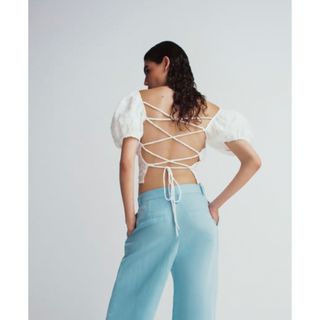 ザラ(ZARA)のZARA パフスリーブレースアップバックトップス(カットソー(半袖/袖なし))