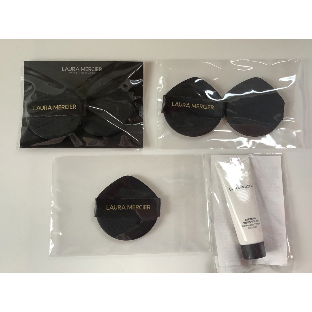 laura mercier(ローラメルシエ)の【未使用】ローラメルシエ　クッションスポンジ　5個　プレゼント付 コスメ/美容のメイク道具/ケアグッズ(パフ・スポンジ)の商品写真