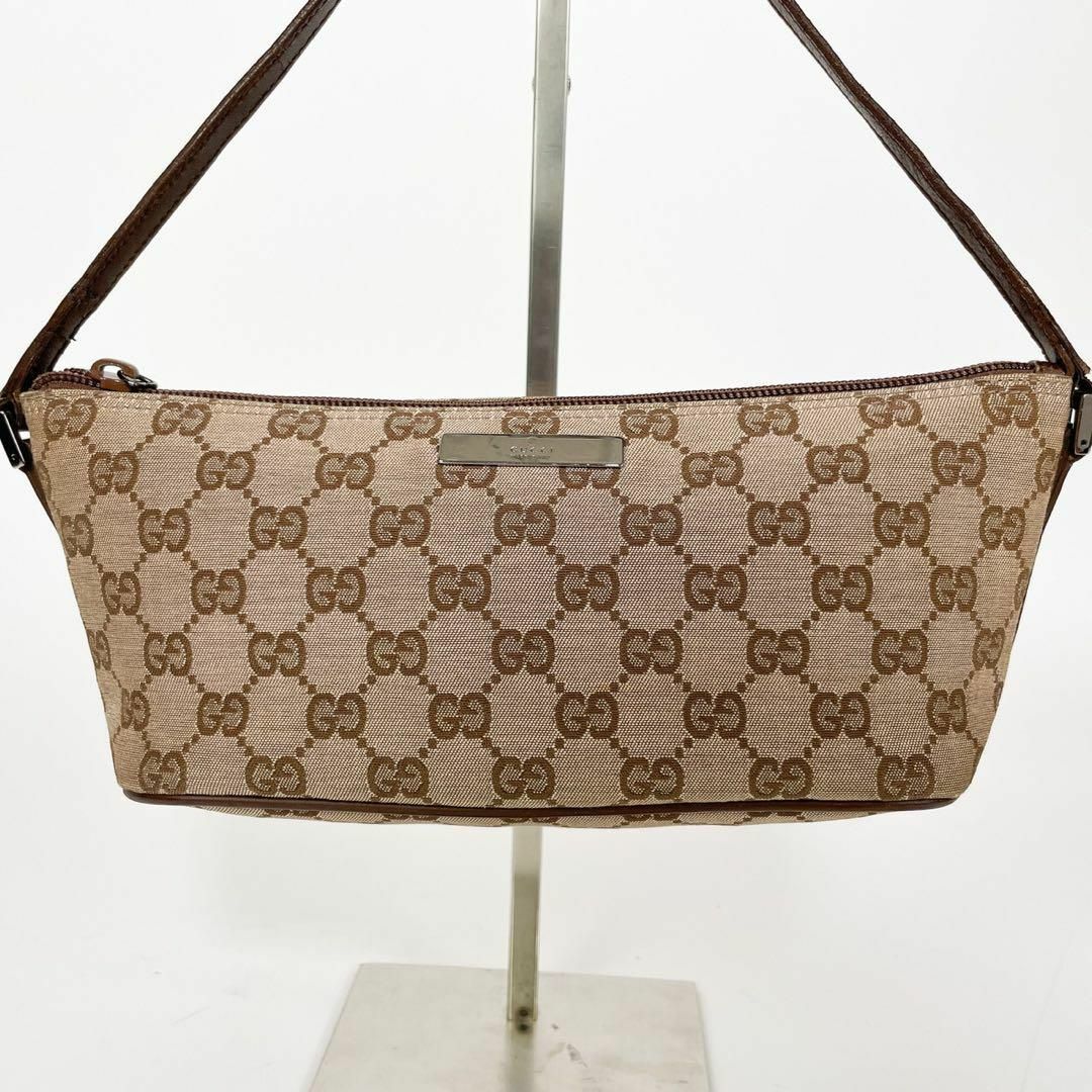 Gucci(グッチ)のGUCCI GG柄 アクセサリーポーチ ミニハンドバッグ ロゴプレート レディースのバッグ(その他)の商品写真