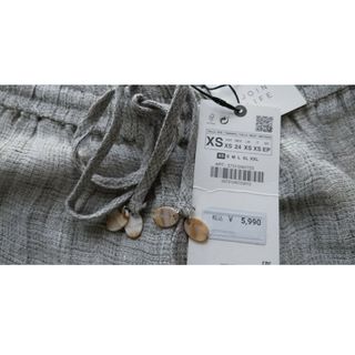 ザラ(ZARA)の未着用タグ付き　ザラ　リネンパンツ　グレー系　リネン100％　XS　24　麻(カジュアルパンツ)