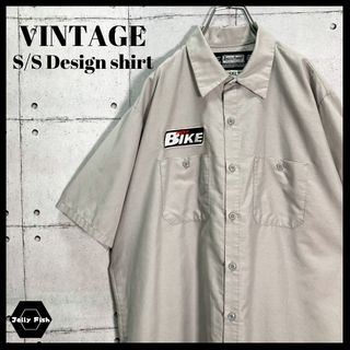 アートヴィンテージ(ART VINTAGE)の【US古着】HOT BIKE MAGAZINE 刺繍デザイン 半袖 ワークシャツ(シャツ)