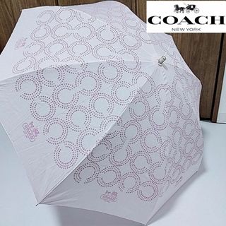 コーチ(COACH)の超美品　コーチ　晴雨兼用　日傘　折りたたみ　シグネチャー　ピンク傘袋付き馬車(傘)