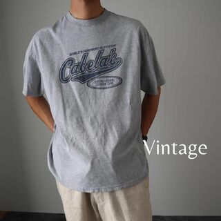 アートヴィンテージ(ART VINTAGE)の【vintage】Cabela's ロゴ プリント ルーズTシャツ グレー XL(Tシャツ/カットソー(半袖/袖なし))