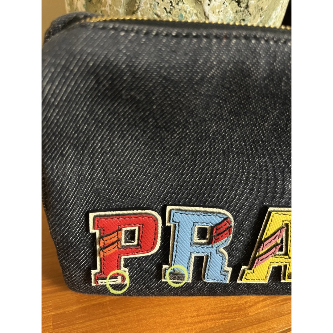 PRADA(プラダ)の【新品未使用】PRADA プラダ　デニムポーチ レディースのファッション小物(ポーチ)の商品写真