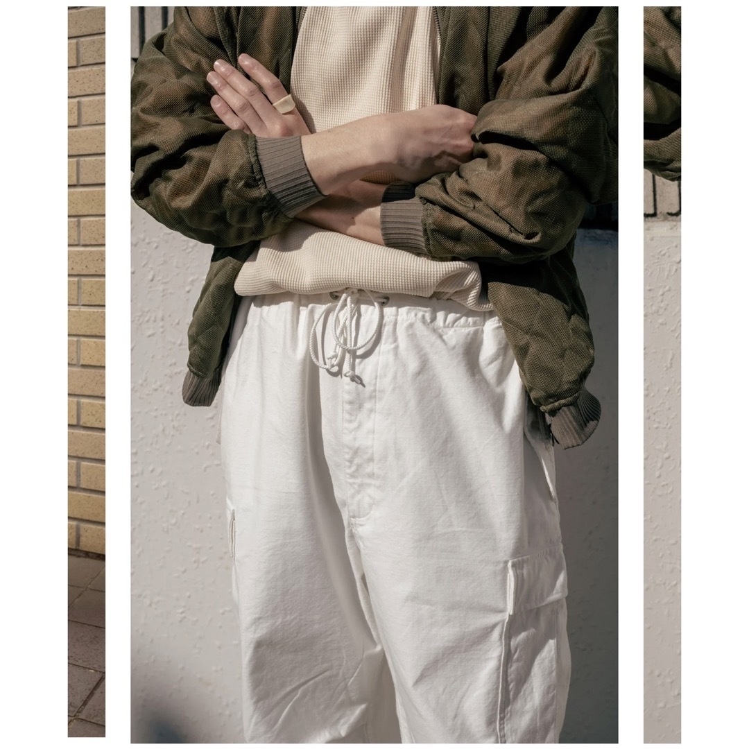 1LDK SELECT(ワンエルディーケーセレクト)のBack Satin M-51 Pants "MILK" CANTÁTE メンズのパンツ(ワークパンツ/カーゴパンツ)の商品写真