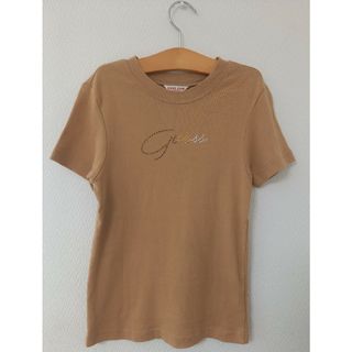 ゲス(GUESS)のGUESS ゲス Tシャツ ストーン ロゴ ブラウン キャメル 茶色 ベージュ(Tシャツ(半袖/袖なし))