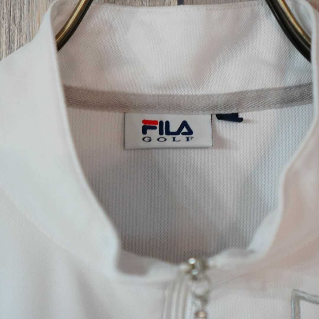 FILA(フィラ)のFILA GOLF スタンドカラージップ半袖ポロシャツ Tシャツカットソー 白M スポーツ/アウトドアのゴルフ(ウエア)の商品写真