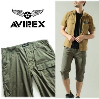 アヴィレックス(AVIREX)の《アヴィレックス》新品 アジャスター付 ストレッチクロップドパンツ L(W84)(ワークパンツ/カーゴパンツ)