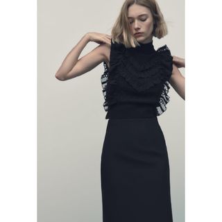 ザラ(ZARA)のZARA　フリル ニット ドローストリングトップス　Sサイズ　ブラック(シャツ/ブラウス(半袖/袖なし))