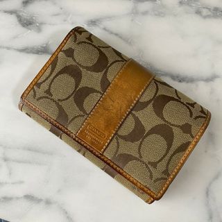 コーチ(COACH)のCOACH コーチ　シグネチャー　キャンバス　二つ折り財布　ベージュ(財布)