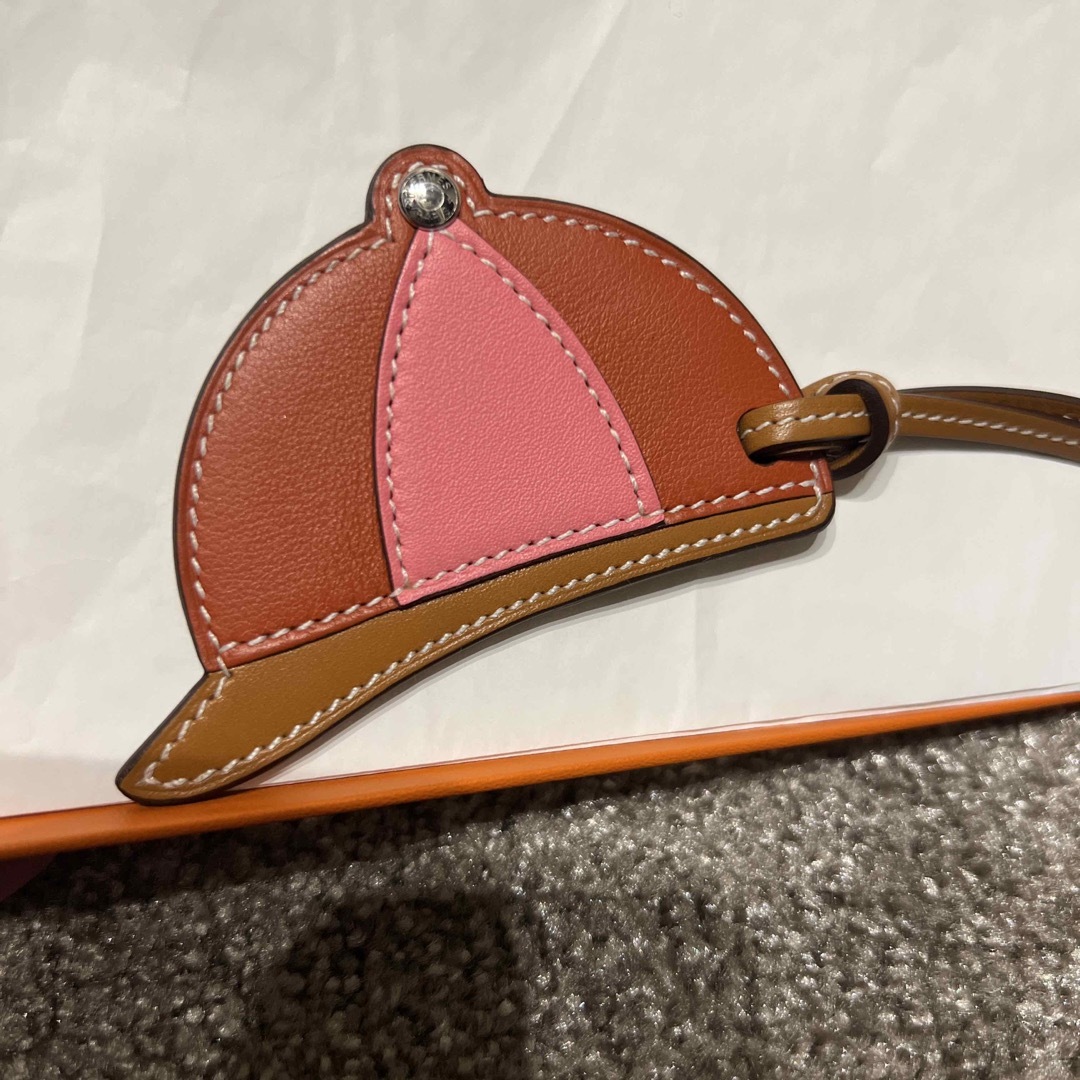 エルメス HERMES チャーム
 ヴォーバトラー パドックセーラー オレンジ