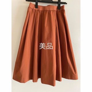 ユニクロ(UNIQLO)のスカート　春夏秋　オレンジ　膝丈　ユニクロ(ひざ丈スカート)