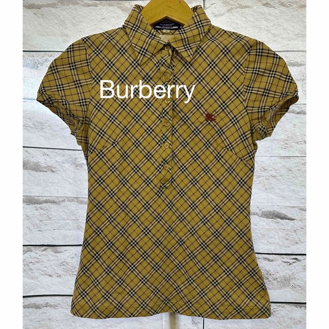 BURBERRY BLUE LABEL(バーバリーブルーレーベル)のかれん様専用！バーバリーロンドン　Burberry ノバチェック　ポロシャツ レディースのトップス(ポロシャツ)の商品写真