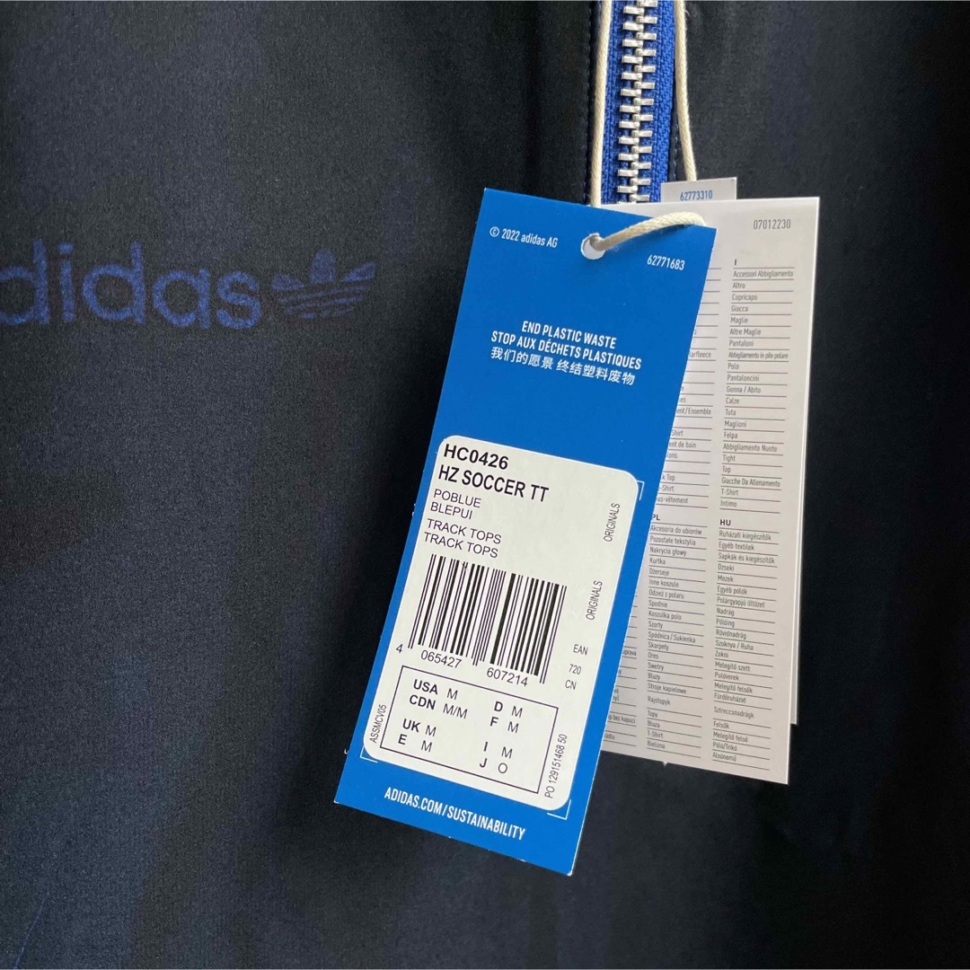 adidas(アディダス)の【新品】adidas  BLUE VERSION ハーフジップトラックジャケット メンズのトップス(ジャージ)の商品写真