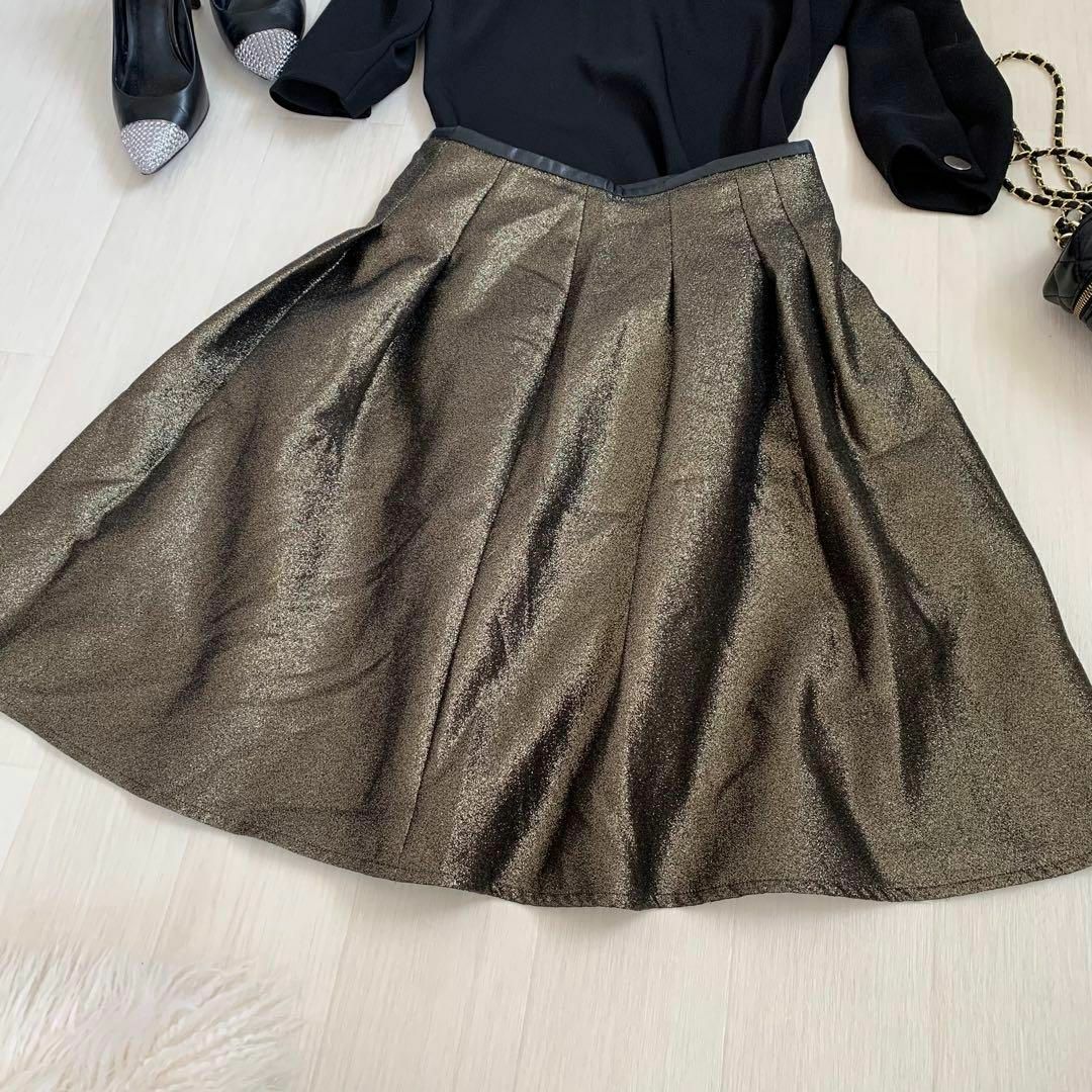 LAUTREAMONT(ロートレアモン)のLAUTREAMONT ロートレアモン　　ゴールドラメスカート日本製 レディースのスカート(ひざ丈スカート)の商品写真