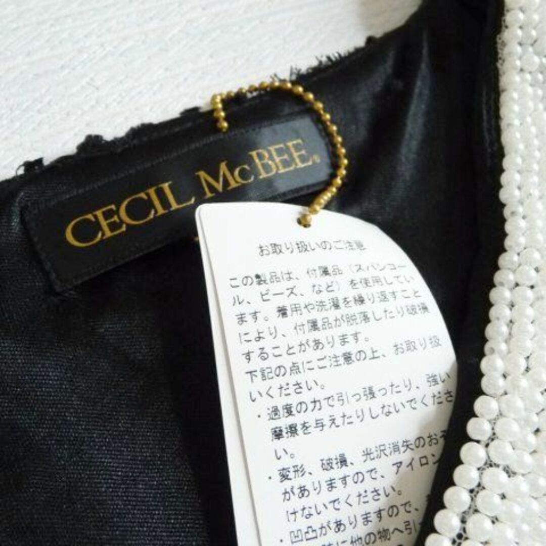 CECIL McBEE(セシルマクビー)の新品 CECIL McBEE セシルマクビー パール衿 ラメ ニット ワンピース レディースのワンピース(ミニワンピース)の商品写真