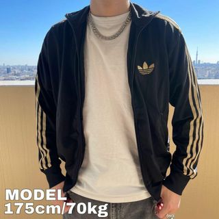 アディダス セットアップ/ジャージ (メンズ)(ゴールド/金色系)の通販