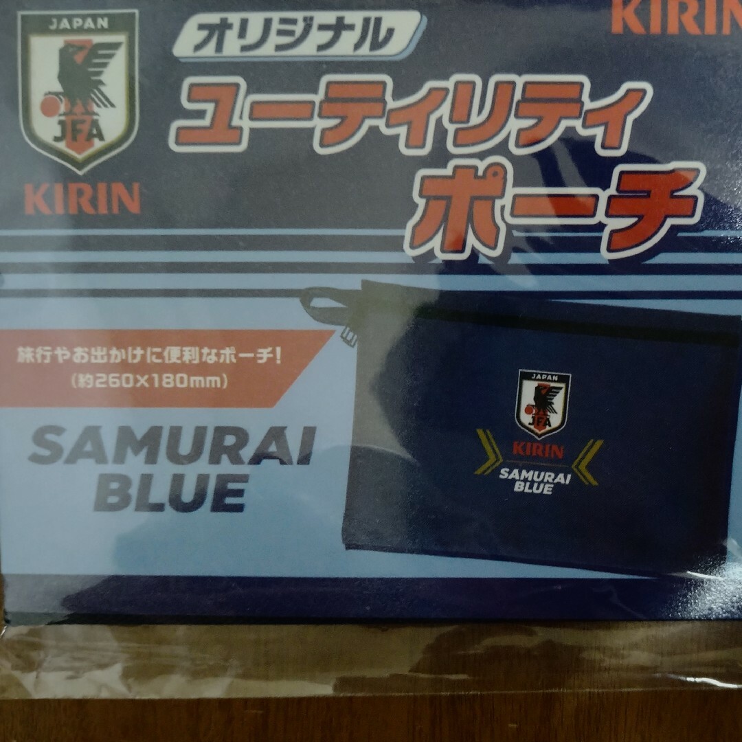 キリン(キリン)の新品 サッカー日本代表 ポーチ SAMURAI BLUE スポーツ/アウトドアのサッカー/フットサル(応援グッズ)の商品写真