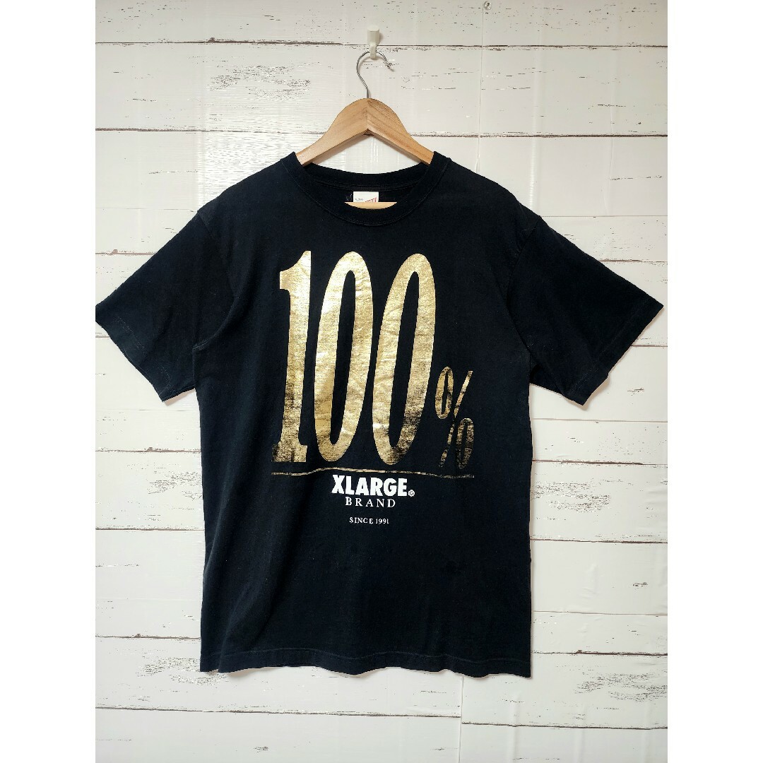 XLARGE(エクストララージ)の《大人気》XLARGE エクストララージ Tシャツ 100%ロゴ 黒 金 L メンズのトップス(Tシャツ/カットソー(半袖/袖なし))の商品写真