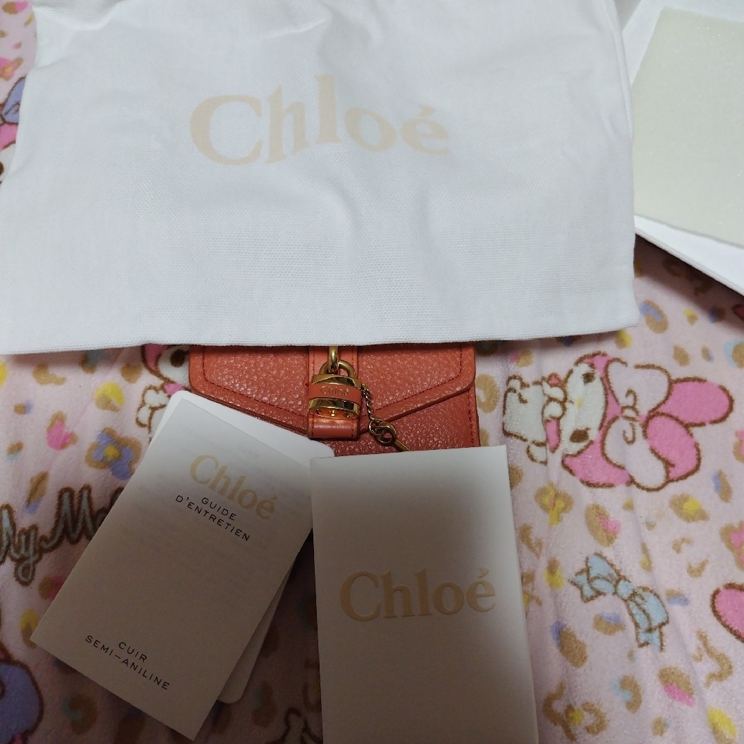 Chloeクロエ財布 南京錠が可愛い 優しめオレンジ系