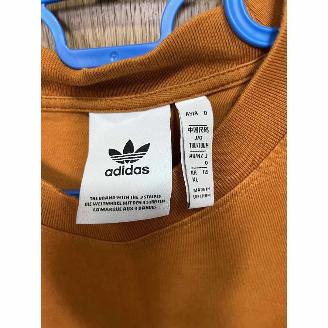 adidas(アディダス)のアディダスtシャツ　オレンジ　XLサイズ メンズのトップス(Tシャツ/カットソー(半袖/袖なし))の商品写真