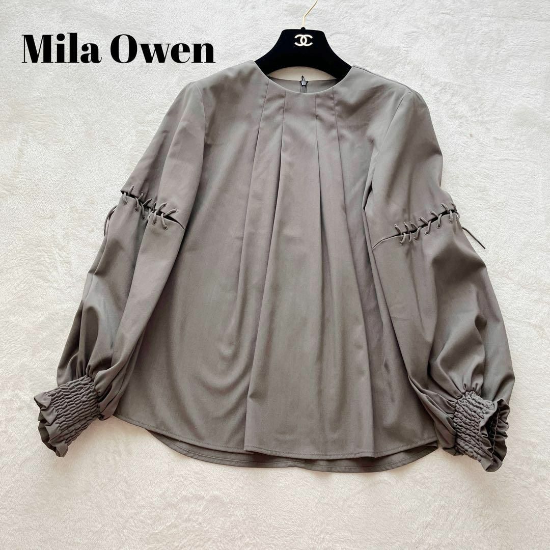 Mila Owen(ミラオーウェン)のMila Owen ミラオーウェン　レースアップスリーブブラウス　カーキ　S レディースのトップス(シャツ/ブラウス(長袖/七分))の商品写真