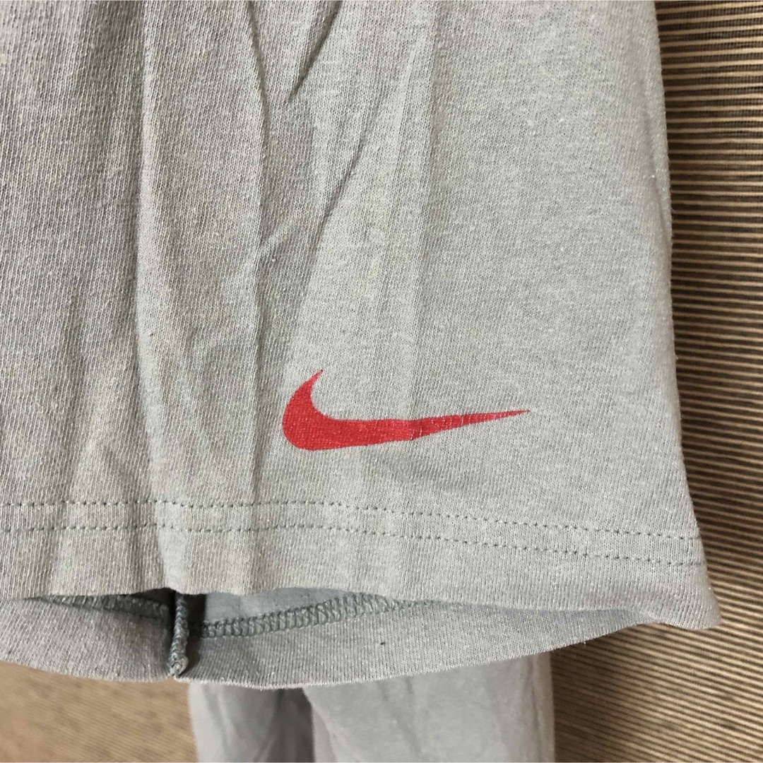 NIKE(ナイキ)の【ナイキ】半袖Tシャツ　スウォッシュロゴ　アメフト　ヘルメット　袖ロゴ32 メンズのトップス(Tシャツ/カットソー(半袖/袖なし))の商品写真