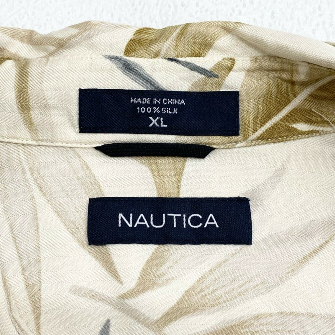 NAUTICA(ノーティカ)のUS古着 ノーティカ NAUTICA シルク アロハシャツ 半袖 総柄 植物柄 サイズ：メンズ XL ライトベージュ【中古】 メンズのトップス(シャツ)の商品写真