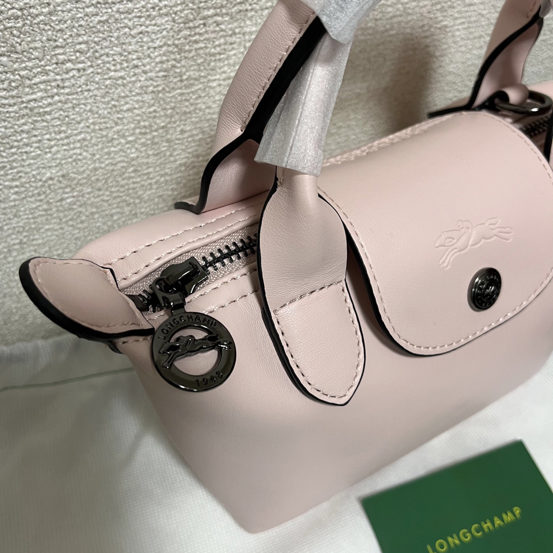 LONGCHAMP(ロンシャン)の【訳あり/新品】ロンシャンル プリアージュ キュイールXS レザーホワイトピンク レディースのバッグ(ショルダーバッグ)の商品写真