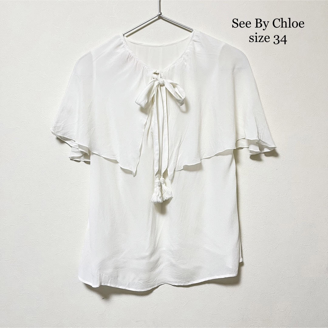 SEE BY CHLOE(シーバイクロエ)のSee By Chloe 襟フリル シアーブラウス ノースリーブ ホワイト レディースのトップス(シャツ/ブラウス(半袖/袖なし))の商品写真