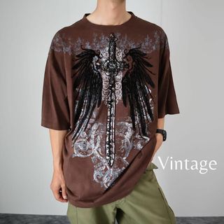 アートヴィンテージ(ART VINTAGE)の【vintage】フェルト 翼 剣 デザイン ルーズTシャツ 2XL 茶 y2k(Tシャツ/カットソー(半袖/袖なし))