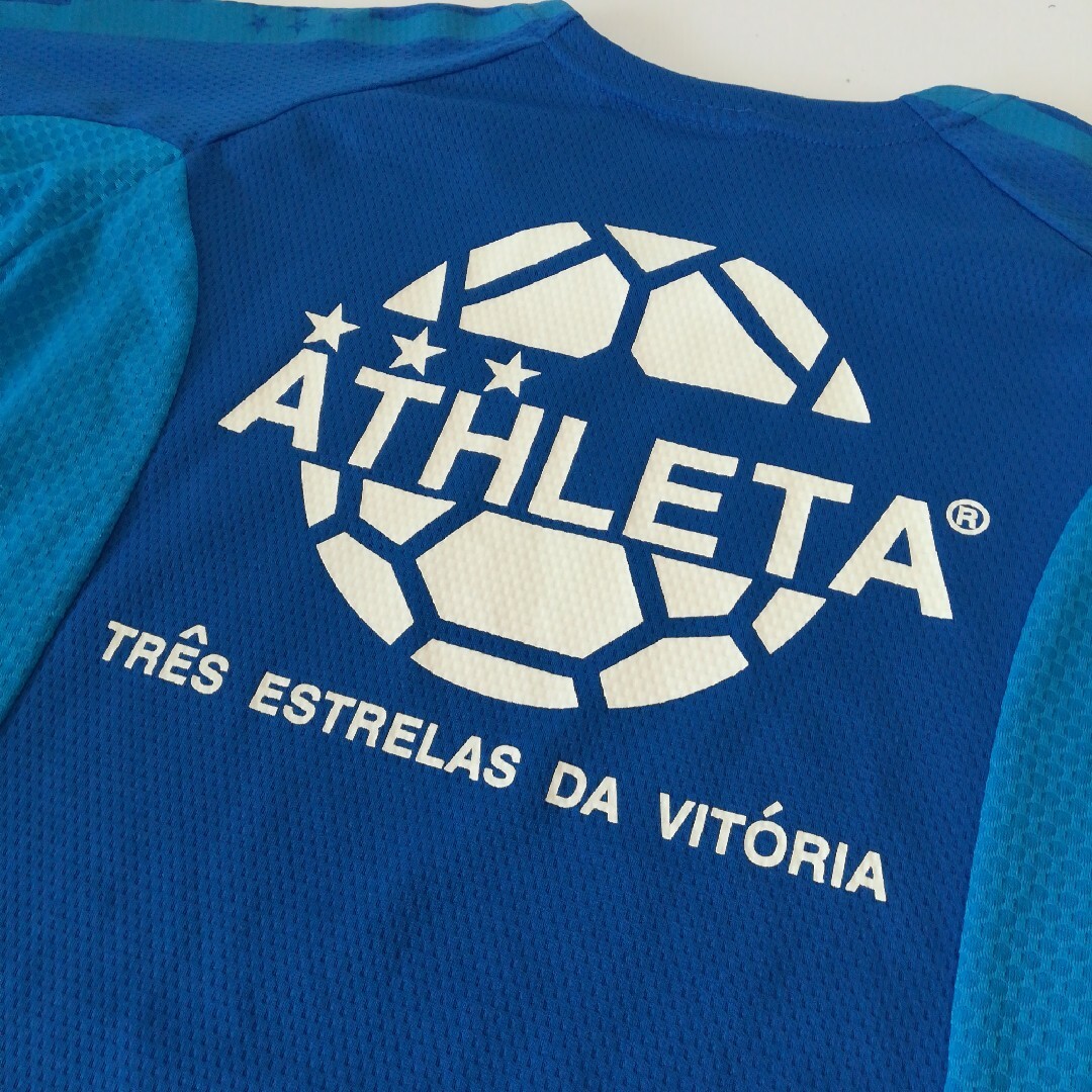 ATHLETA(アスレタ)のアスレタ ATHLETA 半袖トレーニングシャツ キッズ140サイズ 子供用 スポーツ/アウトドアのサッカー/フットサル(ウェア)の商品写真