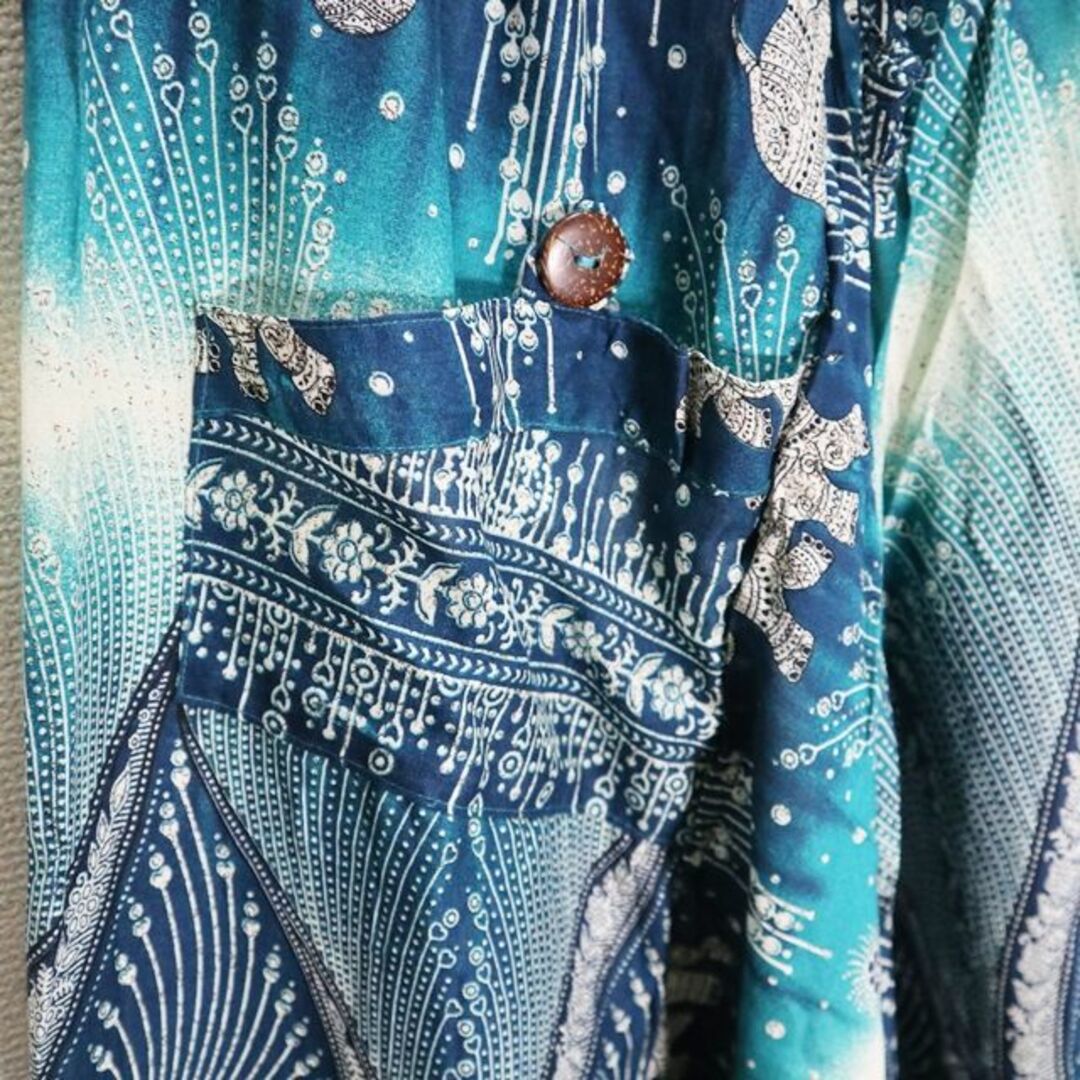 【新品】タラっとしたサルエルパンツ　羽根柄　ブルーグリーン系　ユニセックス　 メンズのパンツ(サルエルパンツ)の商品写真