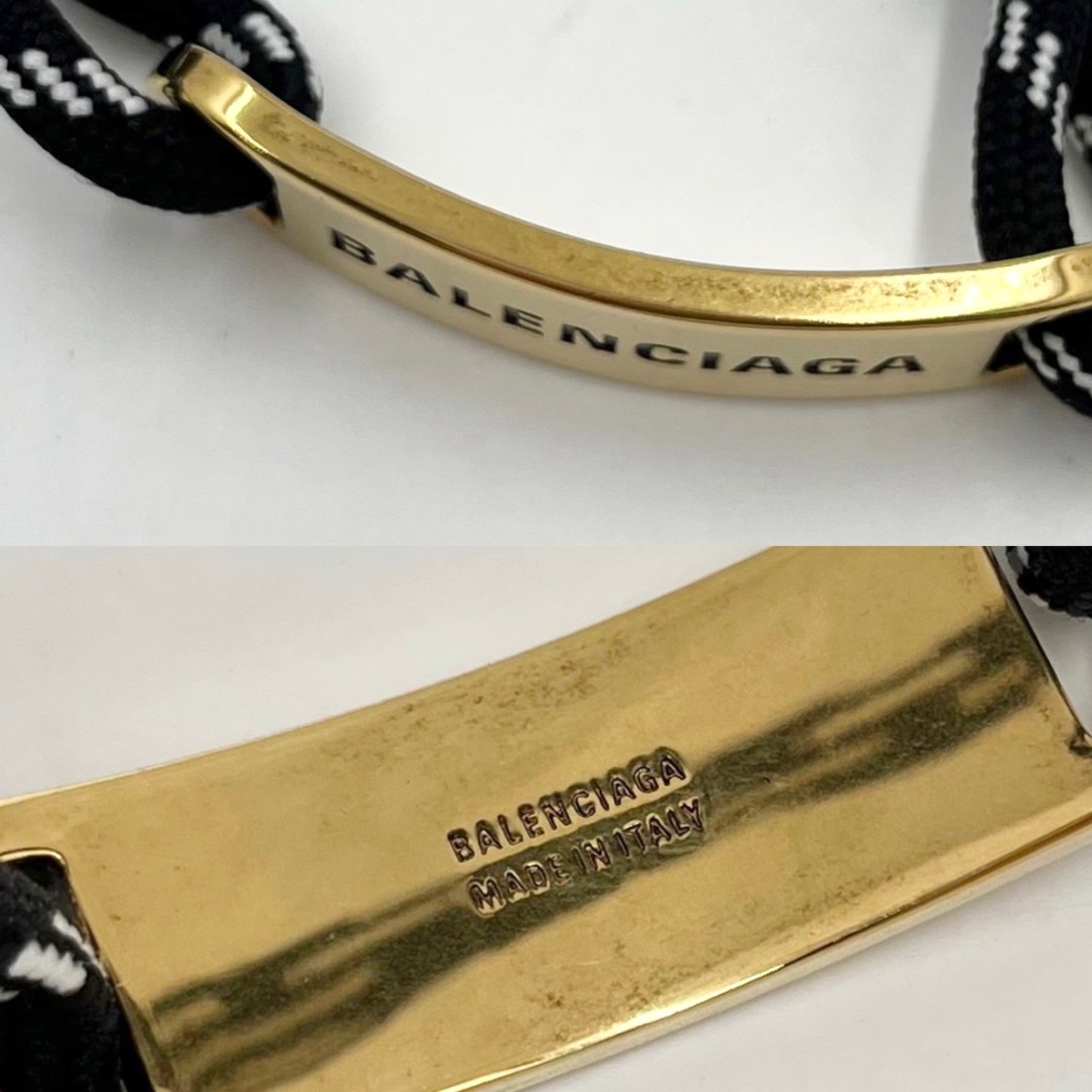 Balenciaga(バレンシアガ)の【値下げ中】BALENCIAGA バレンシアガ バングル PLATEブレスレット ロゴプレート アクセサリー 小物 ポリエステル  コットン  ブラス  656418 ブラック 黒 ゴールド金具 メンズ 約20.8g 人気 美品【中古品】 メンズのアクセサリー(バングル/リストバンド)の商品写真