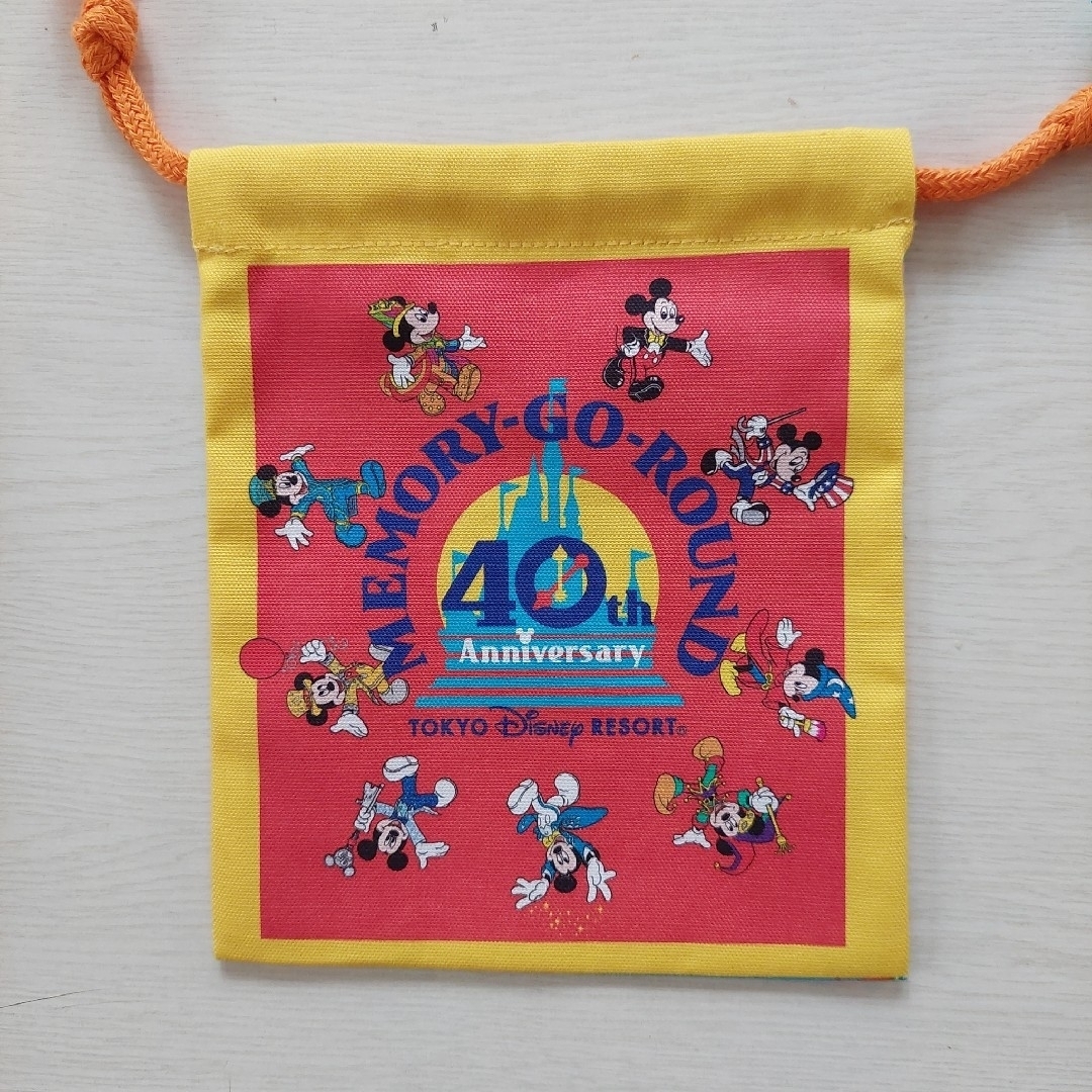 ディズニー　40周年　メモリーゴーラウンド　巾着 エンタメ/ホビーのおもちゃ/ぬいぐるみ(キャラクターグッズ)の商品写真