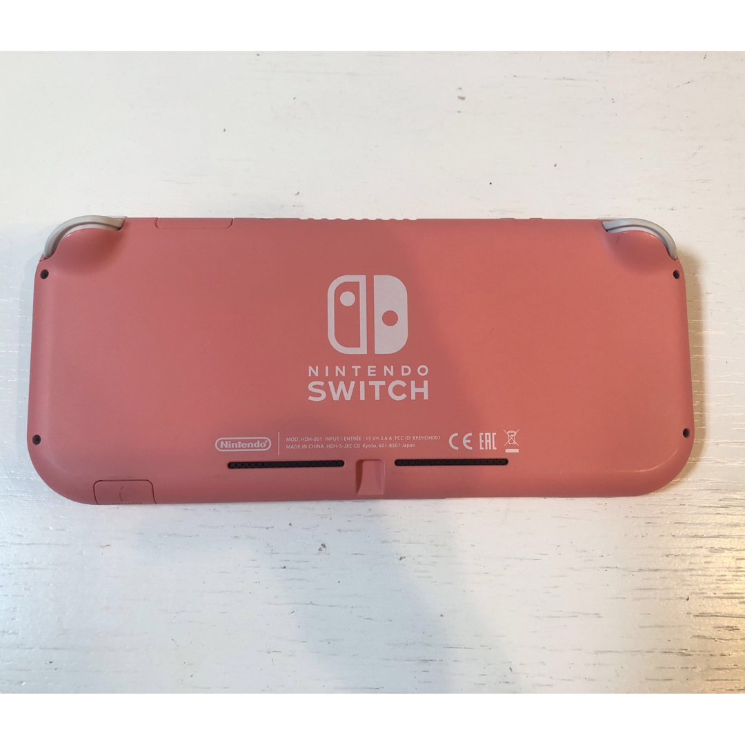 Nintendo Switch(ニンテンドースイッチ)のSwitch Lite,ピンク エンタメ/ホビーのゲームソフト/ゲーム機本体(携帯用ゲーム機本体)の商品写真