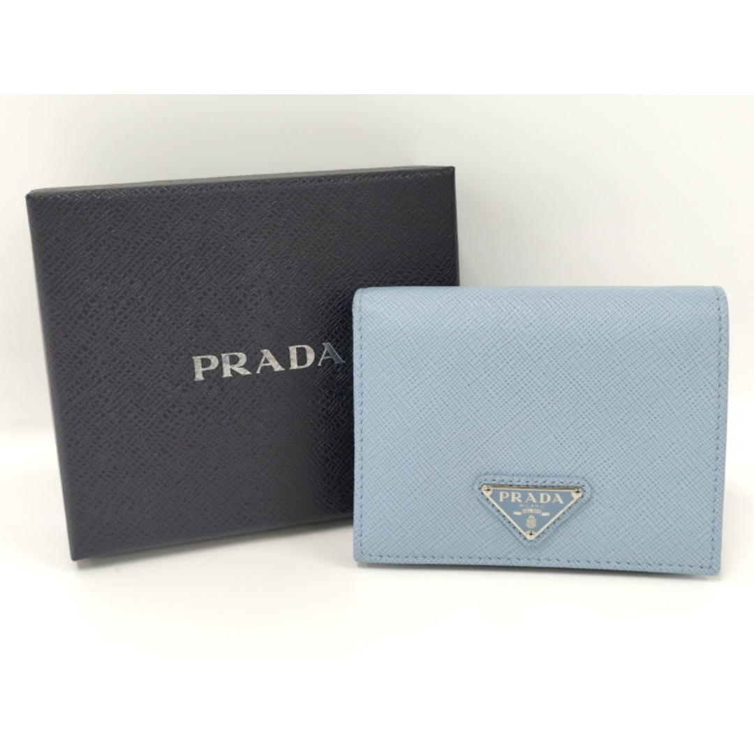 PRADA 二つ折り コンパクト財布 ロゴプレート サフィアーノ レザー PRADA 二つ折り コンパクト財布 ロゴプレート サフィアーノ レザー