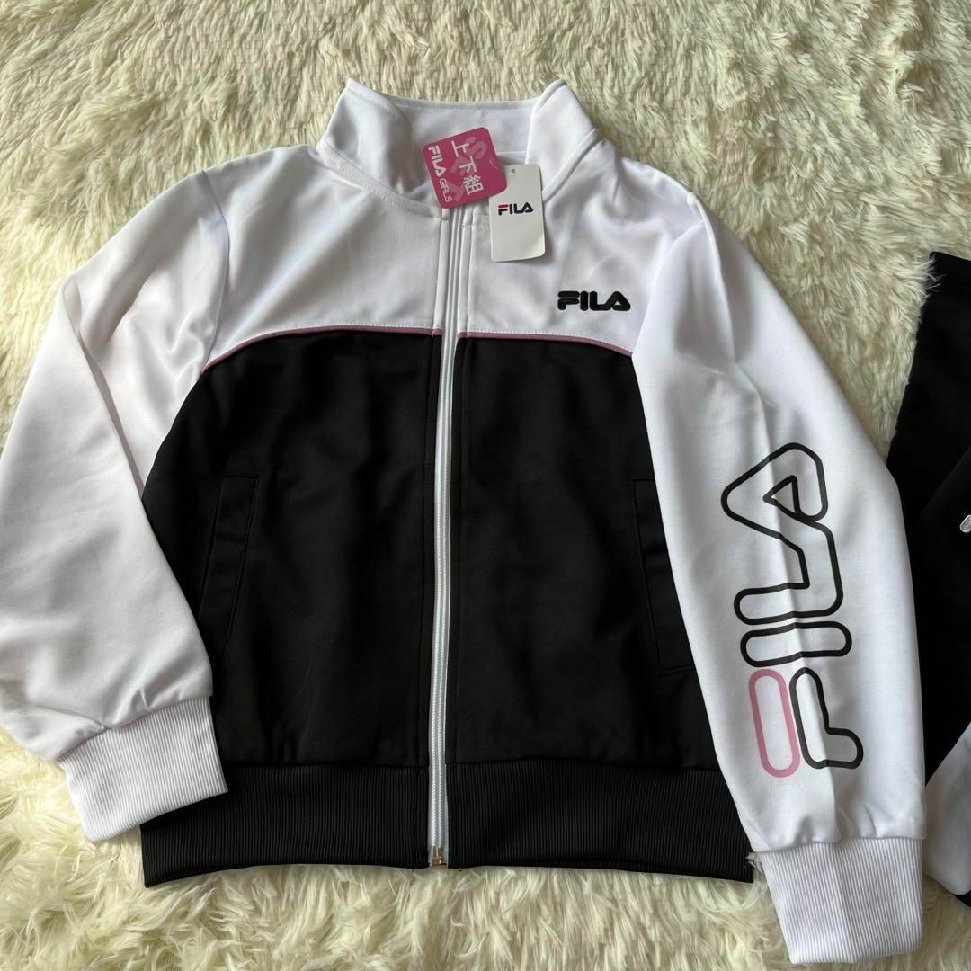 FILA(フィラ)の新品　フィラ ジャージ　上下　セット　 キッズ 　女児　ブラック　黒　140 キッズ/ベビー/マタニティのキッズ服女の子用(90cm~)(その他)の商品写真