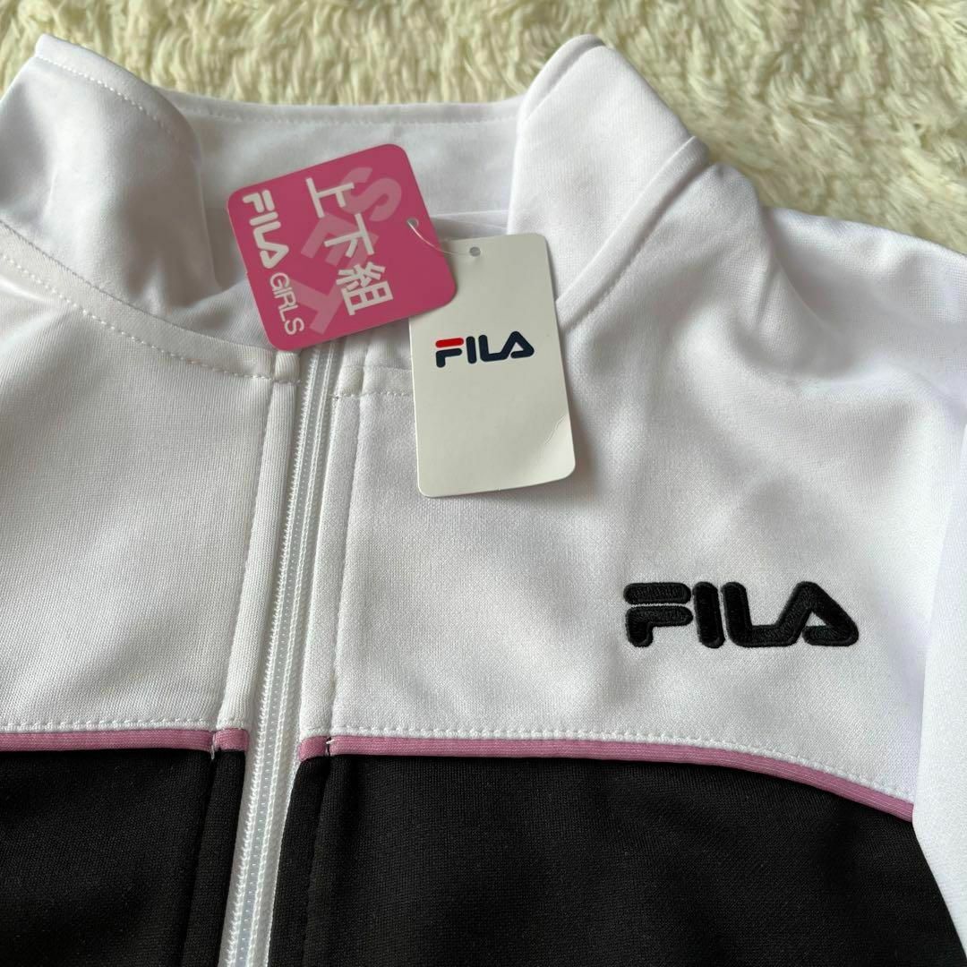 FILA(フィラ)の新品　フィラ ジャージ　上下　セット　 キッズ 　女児　ブラック　黒　140 キッズ/ベビー/マタニティのキッズ服女の子用(90cm~)(その他)の商品写真