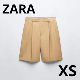 ザラ(ZARA)のZARA フェイクレザーバミューダパンツ　XS ロング丈　ハーフパンツ　ベージュ(ハーフパンツ)