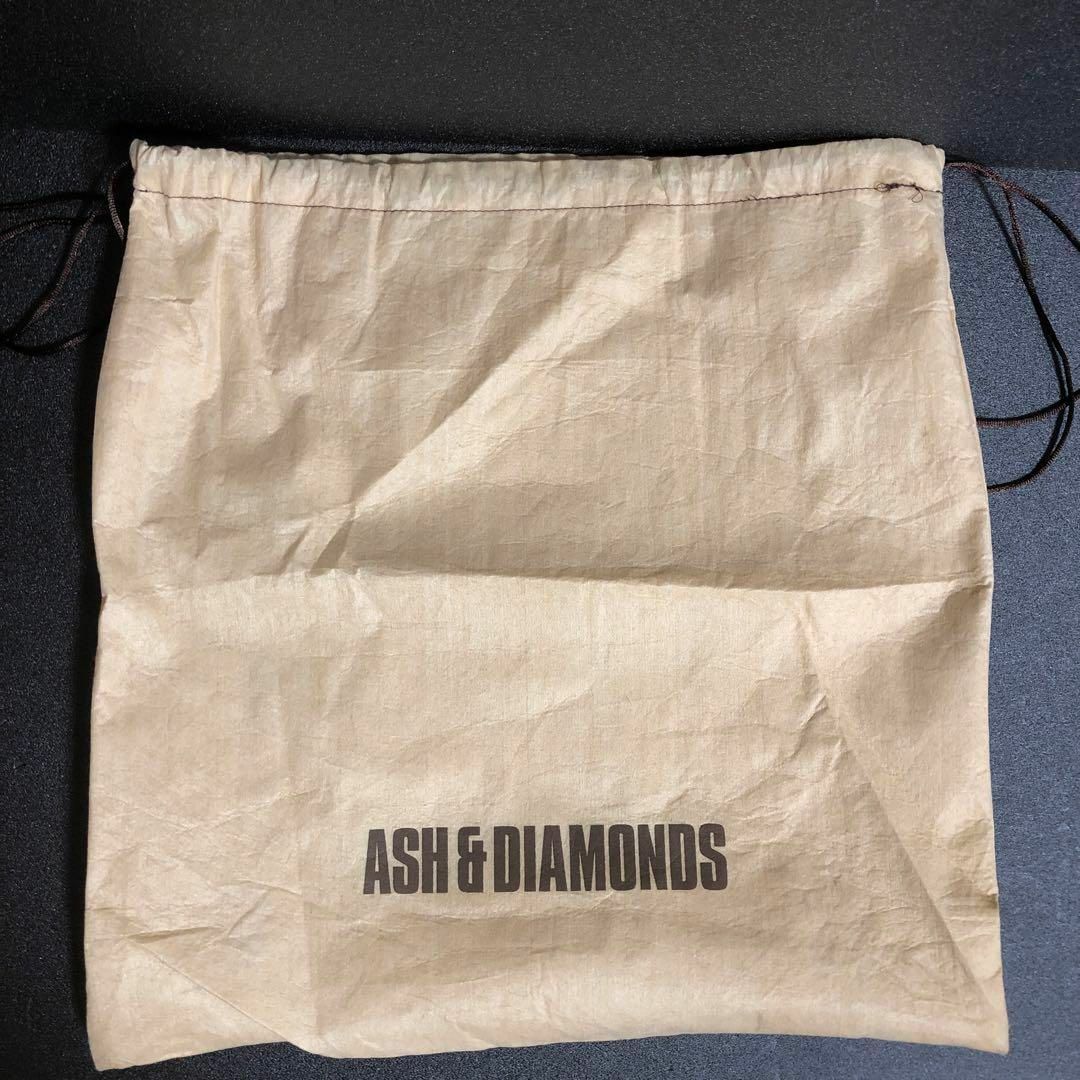 ASH&DIAMONDS(アッシュアンドダイアモンド)のアッシュ＆ダイヤモンド 不織布 巾着袋 ASH&DIAMONDS アッシュ 袋 レディースのバッグ(ショップ袋)の商品写真