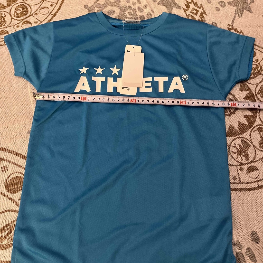 ATHLETA(アスレタ)のアスレタ　ATHLETA 140cm プラクティスシャツ　ブルー　サッカー スポーツ/アウトドアのサッカー/フットサル(ウェア)の商品写真