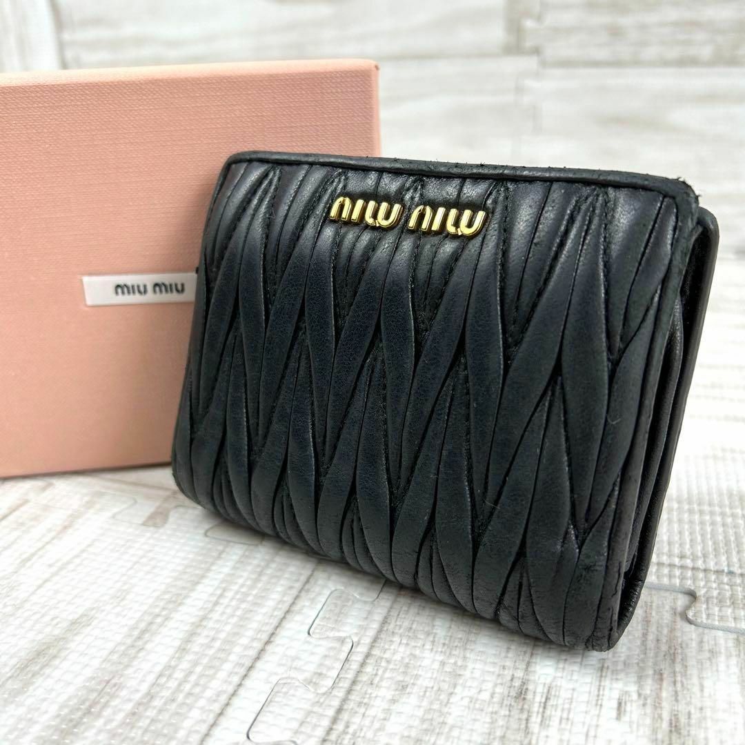 miumiu ミュウミュウ ✨ 二つ折り財布 マテラッセ レザー ロゴ ブラック | フリマアプリ ラクマ