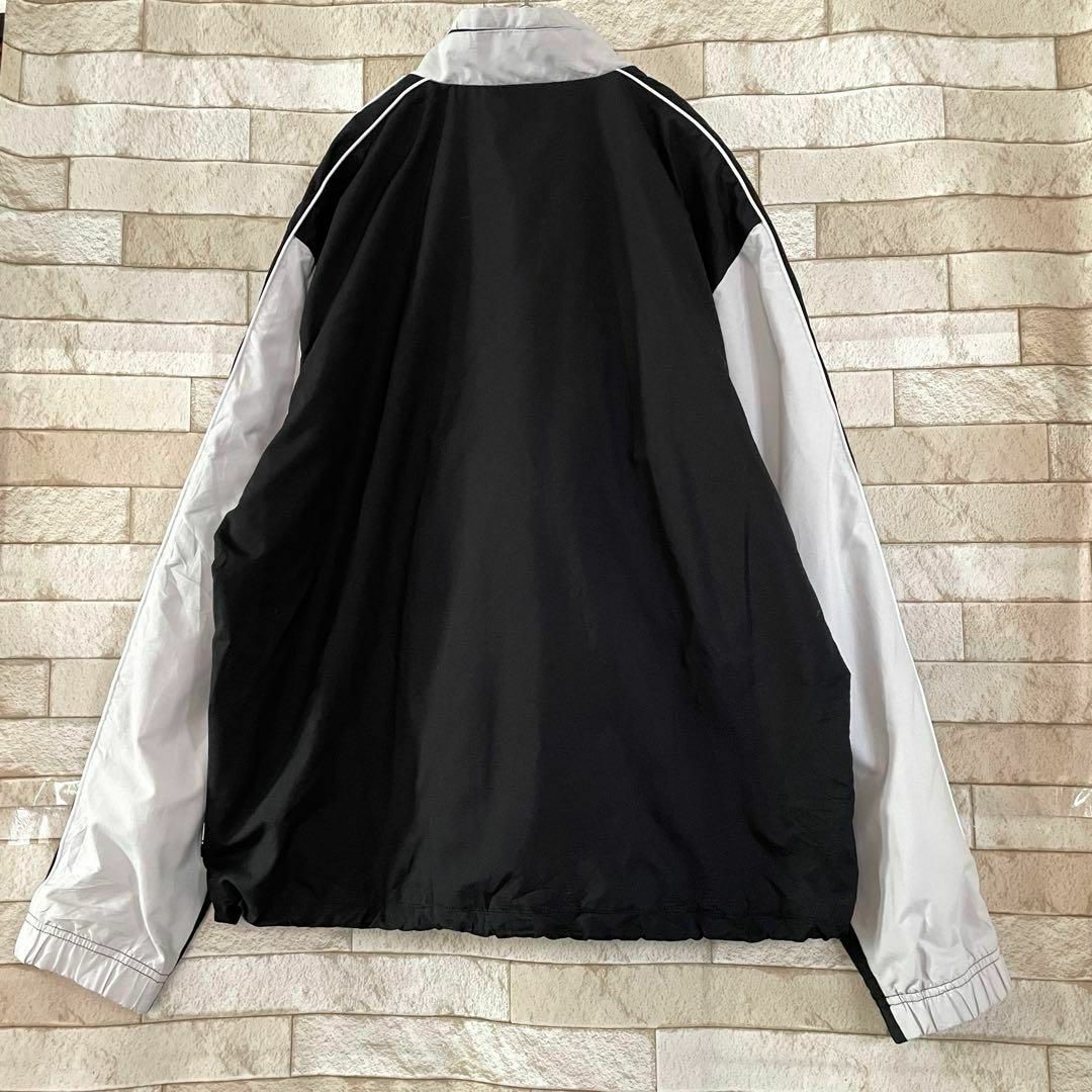 NIKE(ナイキ)のNIKE ナイキ ナイロンジャケット 刺繍ロゴ ブラック グレー L メンズのジャケット/アウター(ナイロンジャケット)の商品写真