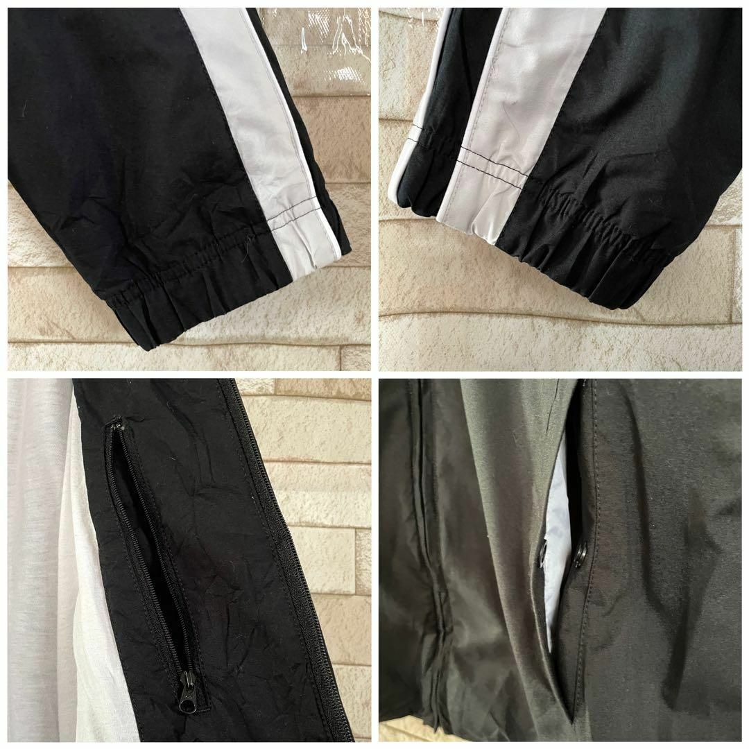 NIKE(ナイキ)のNIKE ナイキ ナイロンジャケット 刺繍ロゴ ブラック グレー L メンズのジャケット/アウター(ナイロンジャケット)の商品写真