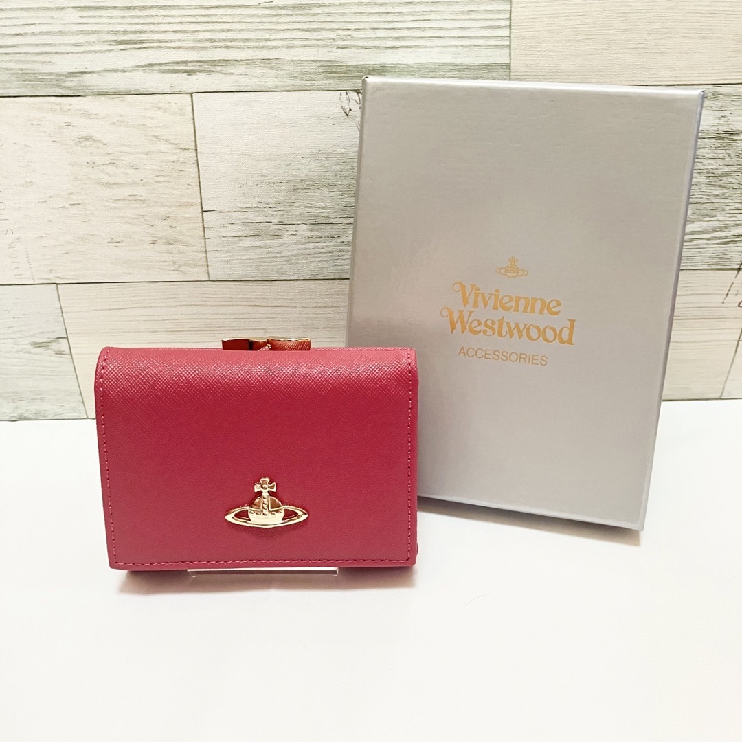 Vivienne Westwood(ヴィヴィアンウエストウッド)の【匿名配送】ヴィヴィアン ウエストウッド　折り財布　ピンク　ピーチ　新品 レディースのファッション小物(財布)の商品写真