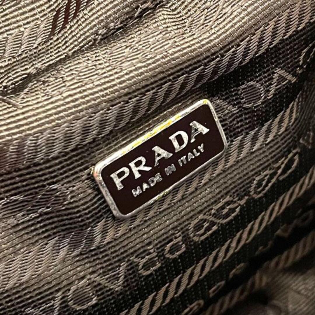 PRADA(プラダ)のプラダ ポーチ トライアングル トラベルポーチ レザー 革 ダークブラウン レディースのバッグ(その他)の商品写真